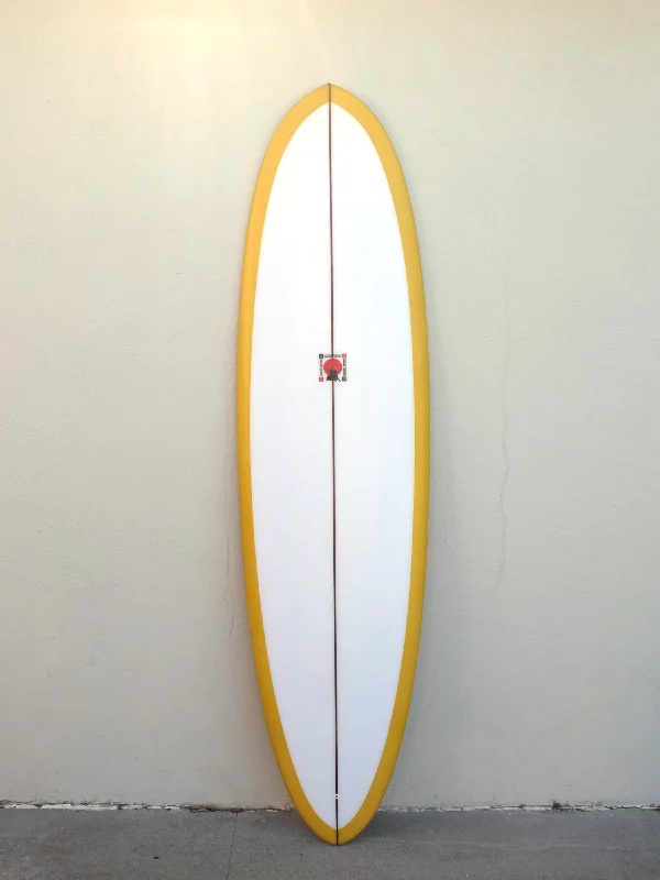 surfboard edge protectors for minimizing damage-Kris Hall | Egg 7’0” Mustard